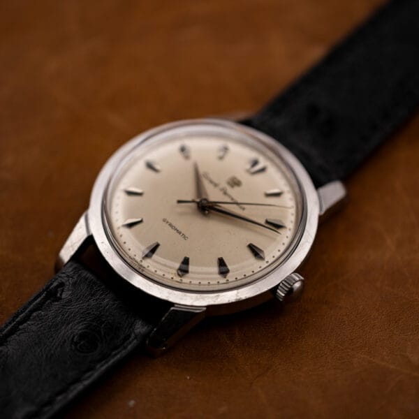 Angled Girard Perregaux Gyromatic view showing raised crystal and ridged winding crown