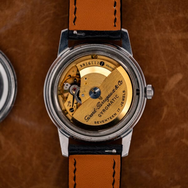 Open Girard Perregaux Gyromatic case displaying automatic rotor marked seventeen jewels