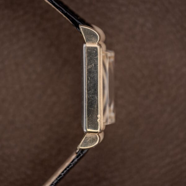 Opposite-side profile of Gruen Precision 335/756 showing the straight case flank, curved lugs and projecting crystal