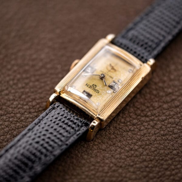 Gruen Precision 335/756 viewed from the twelve o'clock end, with grooved bezel rails framing the dial