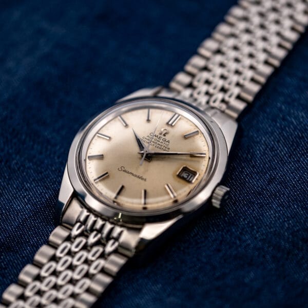 Angled Omega Seamaster 168.024 with smooth bezel, raised crystal, winding crown and rounded bracelet links