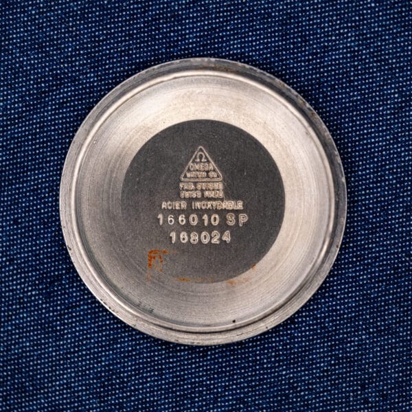 Omega Seamaster inner caseback stamped with both 166010 SP and 168024 references beneath the maker's emblem