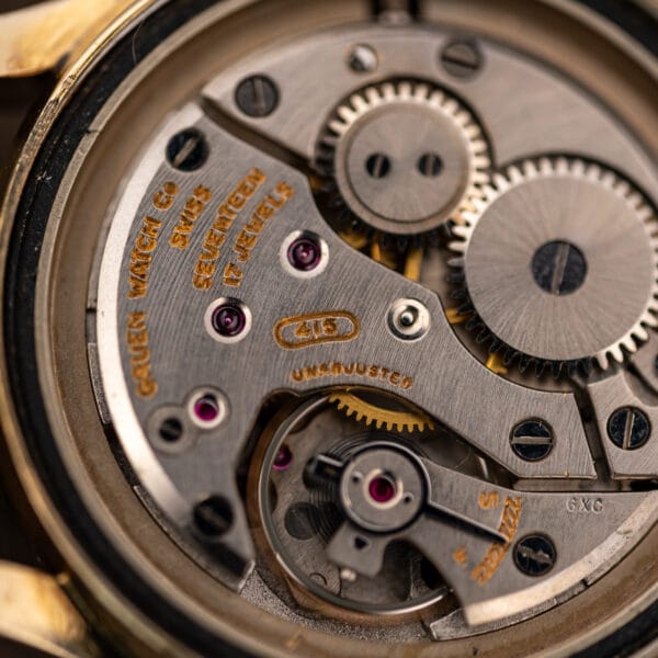 Gruen caliber 415 movement close-up with SEVENTEEN 17 JEWELS lettering, balance assembly and regulator