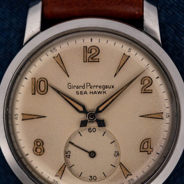 Girard Perregaux Sea Hawk dial close-up with Arabic numerals, pointed hour markers and subsidiary seconds