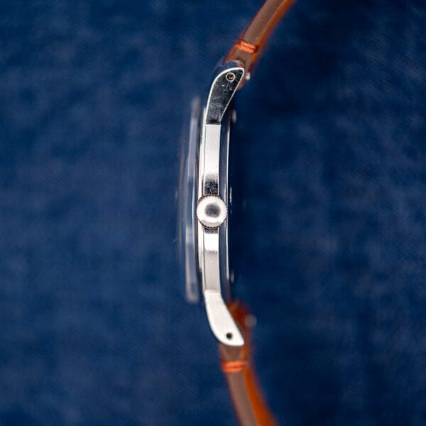 Girard Perregaux Sea Hawk crown-side profile showing the winding crown, raised crystal and drilled lug ends