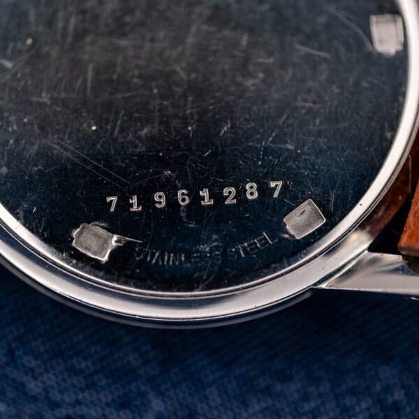 Girard Perregaux Sea Hawk caseback close-up centered on the numbered marking and STAINLESS STEEL lettering