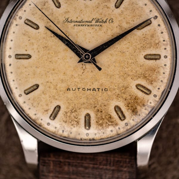 Lower IWC automatic dial with mottled patina, applied markers and Swiss signature