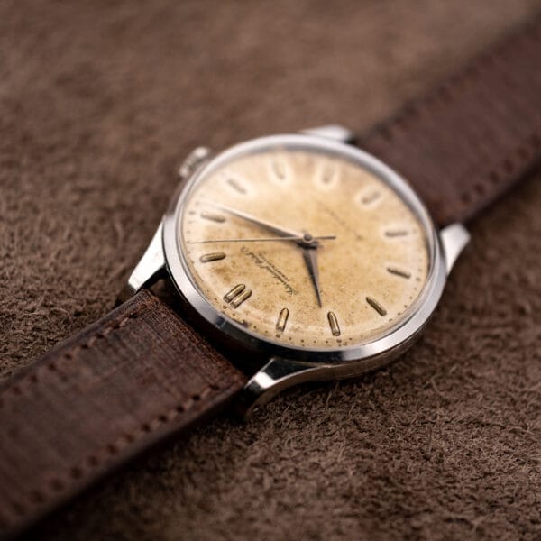 Twelve-side view of IWC automatic showing double hour marker and domed crystal