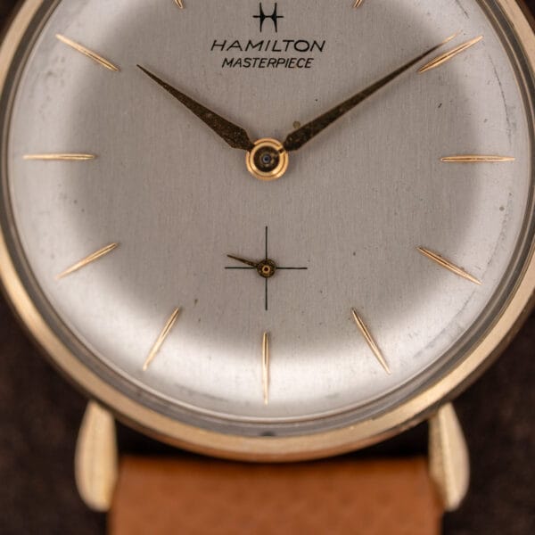 Lower Hamilton Masterpiece dial detail with subsidiary seconds, cross lines and tapered gold-tone hour markers