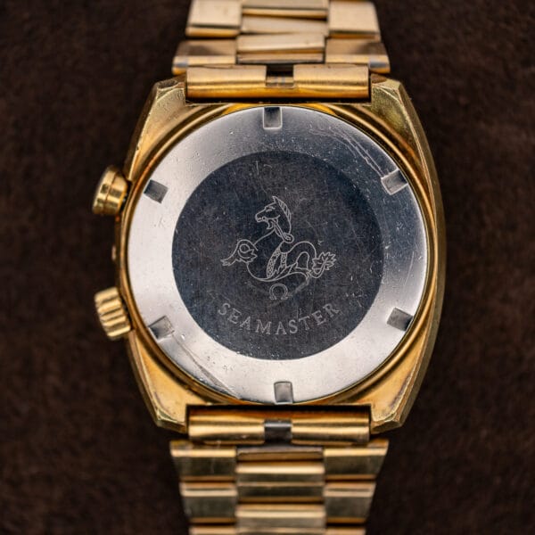 Omega Seamaster Memomatic 166.072 caseback with seahorse engraving, Omega emblem and six opening recesses