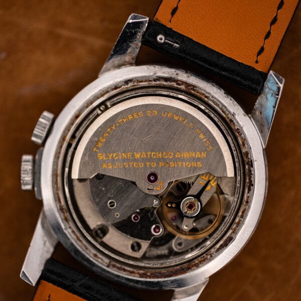 Close-up of the Glycine Airman automatic rotor with its 23-jewel inscription and balance assembly visible below