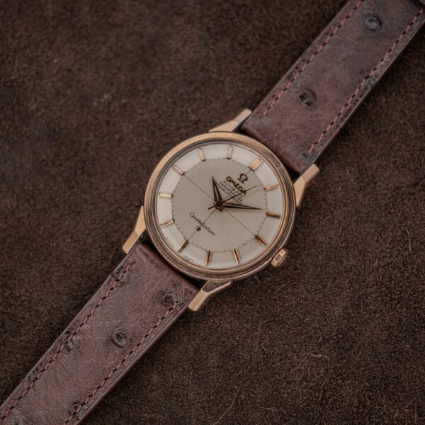 Full diagonal view of Omega Constellation 167.005 on its chocolate brown stitched ostrich strap