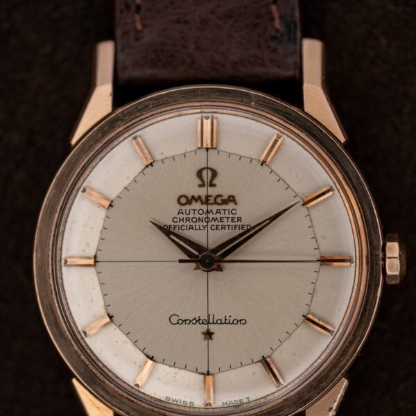 Omega Constellation 167.005 dial closeup showing officially certified chronometer text and faceted pie pan perimeter