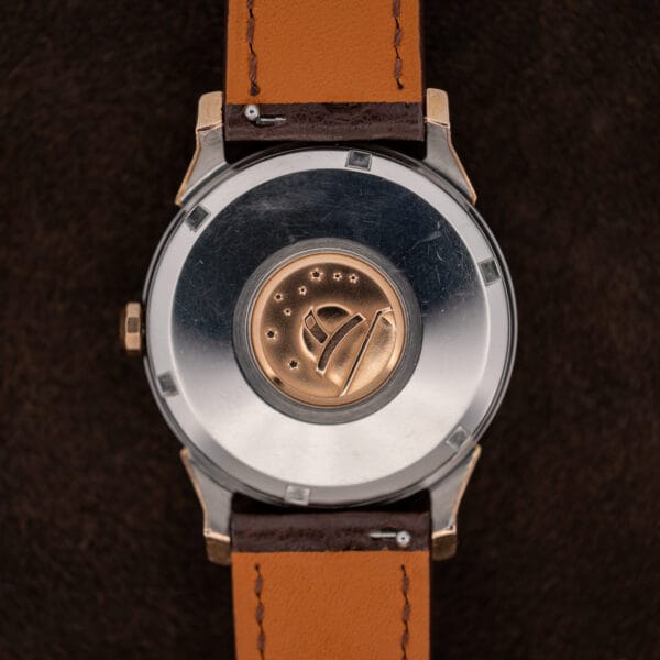 Omega Constellation 167.005 caseback featuring an observatory medallion and eight stars within a steel back