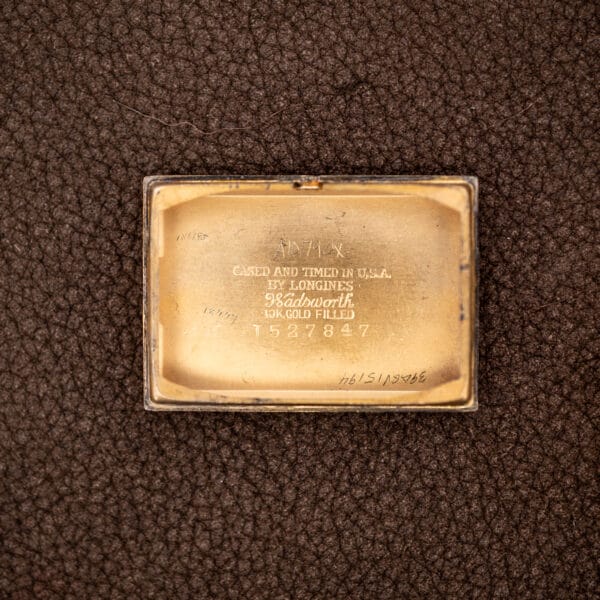 Longines inner caseback with Wadsworth signature, gold-filled marking and CASED AND TIMED IN U.S.A. inscription
