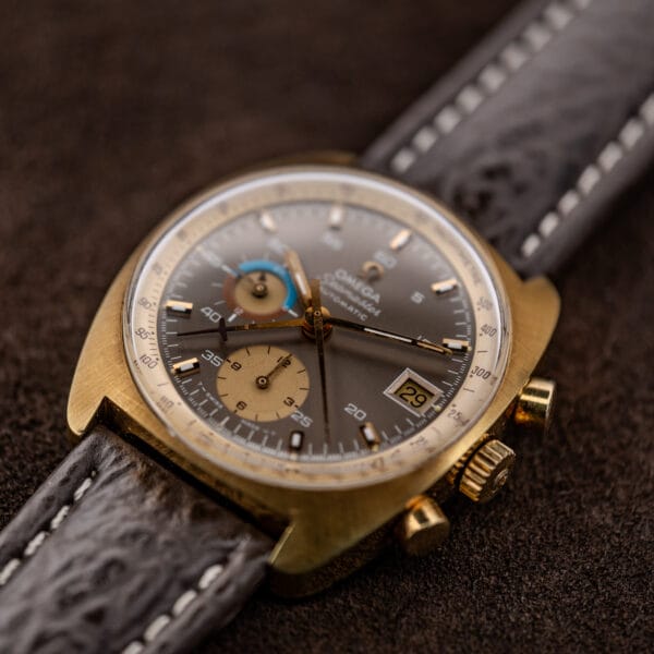 Oblique crown side view of Omega 176.007 highlighting its raised crystal and two chronograph pushers