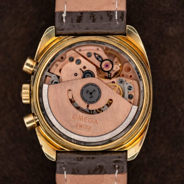 Open case of Omega Seamaster 176.007 revealing its automatic movement and copper toned Omega signed rotor