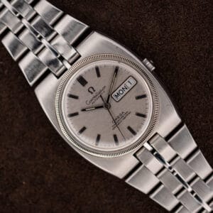 Omega Constellation 168.045 silver day-date dial and integrated steel bracelet in a diagonal close view