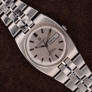Omega Constellation 168.045 silver day-date dial and integrated steel bracelet in a diagonal close view