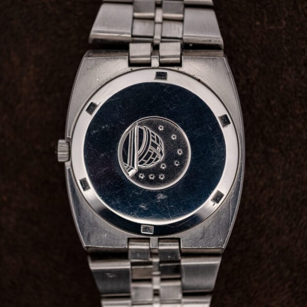 Constellation 168.045 caseback with observatory medallion, eight stars and notched circular perimeter