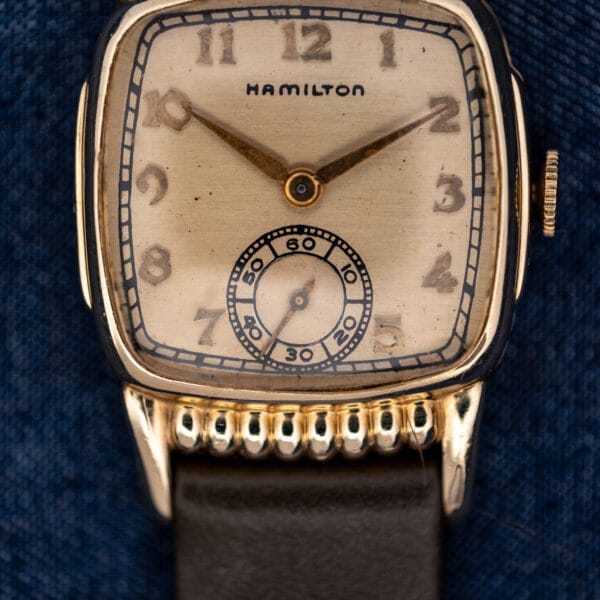 Hamilton Roland lower dial detail with circular subsidiary seconds, railway track and rounded case decoration