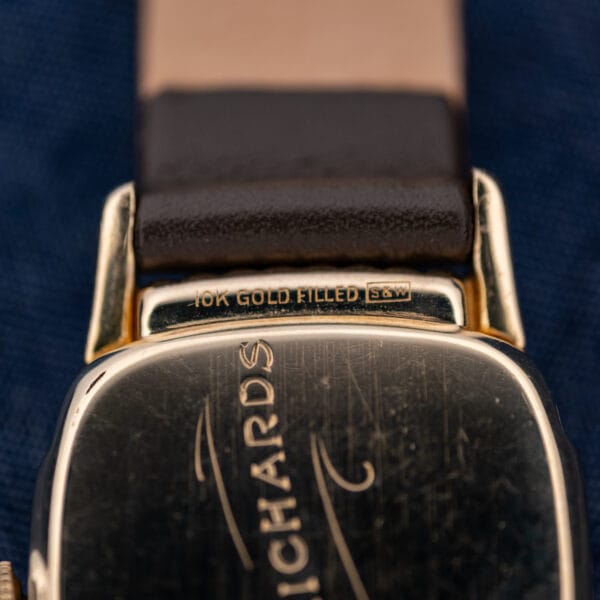 Hamilton Roland caseback detail showing 10K GOLD FILLED and S&W marks above personalized engraving