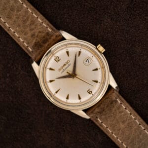 Movado Automatic 64389 with white dial, framed date window and stitched leather strap