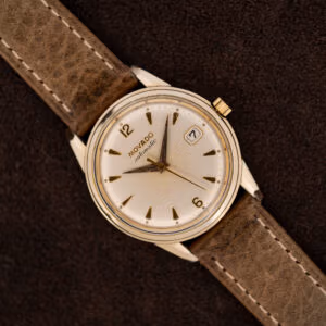 Movado Automatic 64389 with white dial, framed date window and stitched leather strap