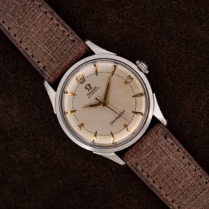 Omega Seamaster 2635-9 SC with eggshell dial, applied Arabic numerals, dauphine hands, and brown textured strap