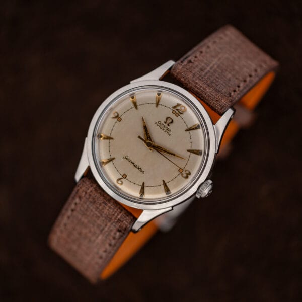 Omega Seamaster 2635-9 SC viewed from the opposite diagonal with its crown and eggshell dial visible