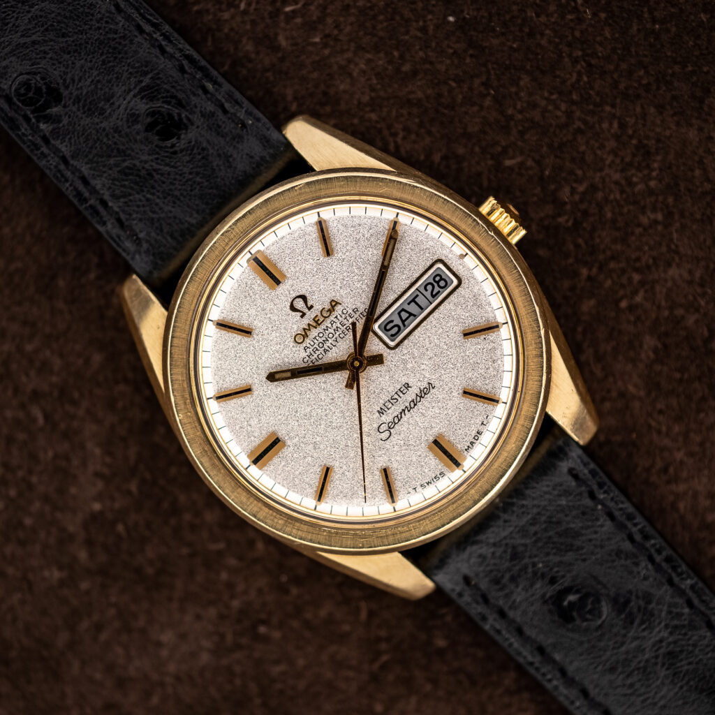 Omega Seamaster 168.023 angled dial view with day-date window and textured black ostrich strap