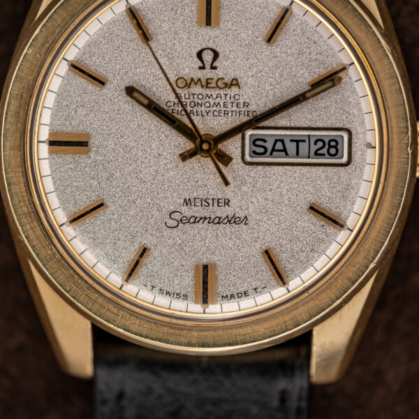 Omega Seamaster Meister dial detail showing lower signature, textured surface and Swiss marking beneath six