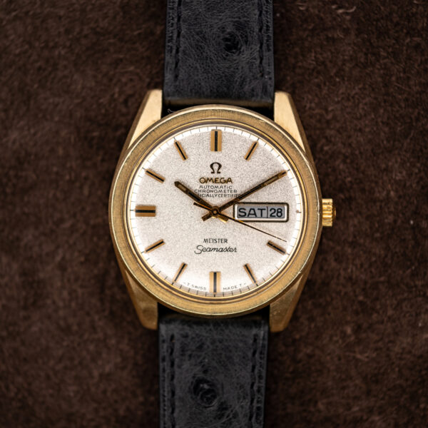 Omega Seamaster 168.023 frontal portrait with Meister signature and black ostrich strap extending above and below