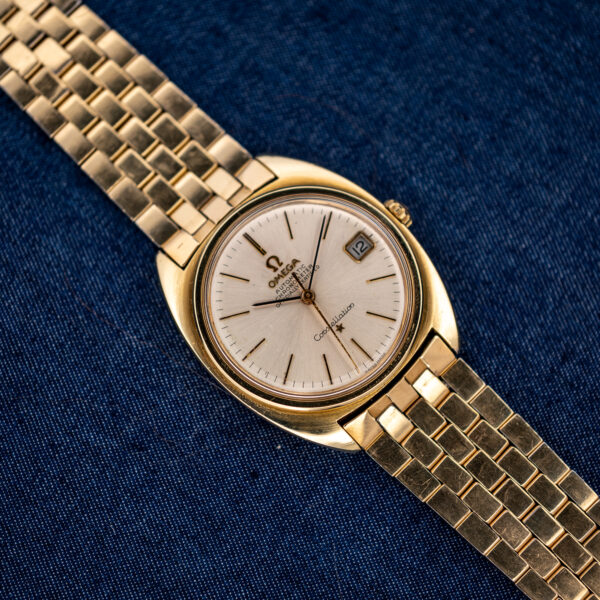 Omega Constellation 168.017 wide overhead composition with silver dial and extended metal bracelet