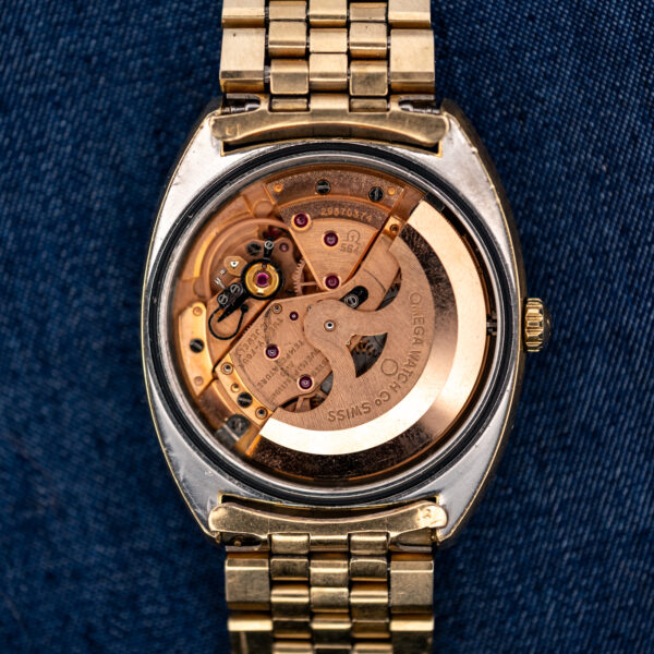 Omega Constellation 168.017 open movement view showing automatic rotor, bridges and attached bracelet
