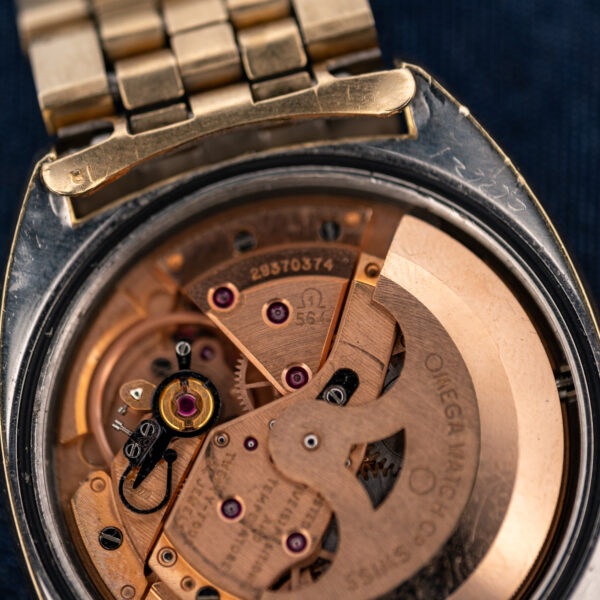 Omega Constellation 168.017 movement close-up emphasizing caliber marking, jeweled bridge and curved automatic rotor