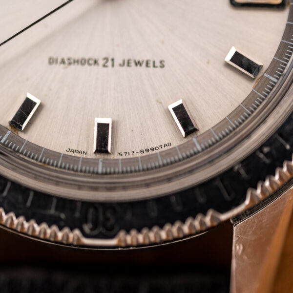 Macro of the Seiko dial edge with the printed JAPAN mark and the 5717-8990T AD code