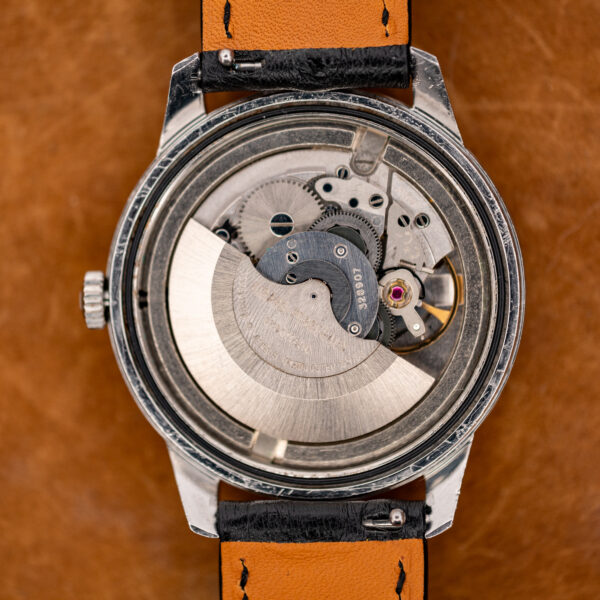 Girard Perregaux Gyromatic open movement view with automatic rotor, visible gears and surrounding case ring