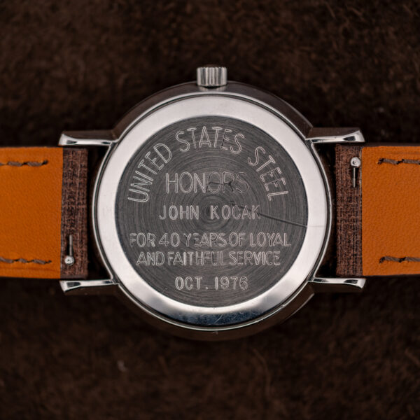 Omega automatic engraved caseback honoring John Kocak for forty years of service to United States Steel