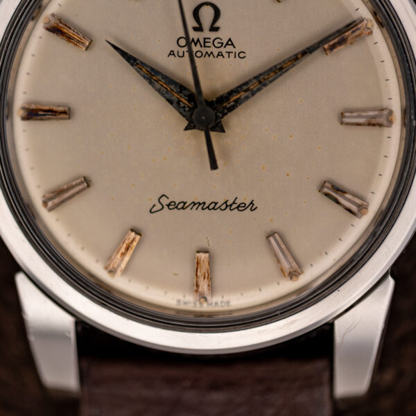 Omega Seamaster 14761 lower dial detail with script signature, applied indices and Swiss Made marking