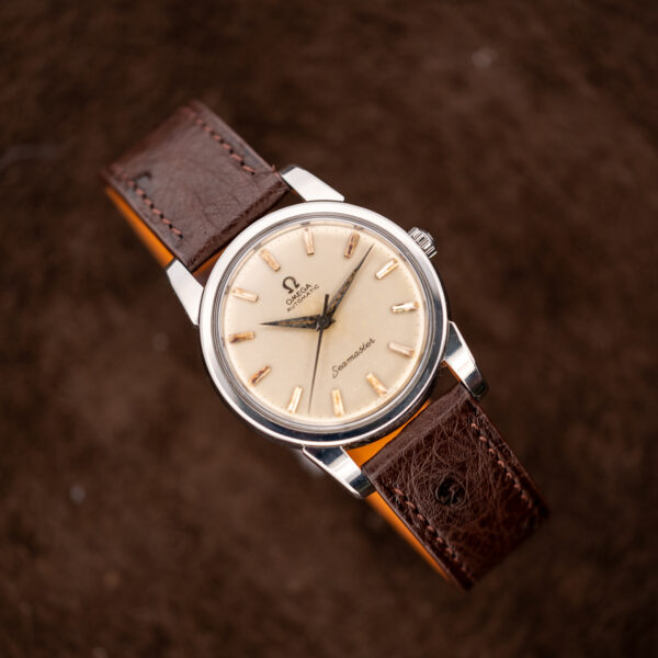 Omega Seamaster 14761 reversed diagonal portrait with applied markers and curved choco brown ostrich strap
