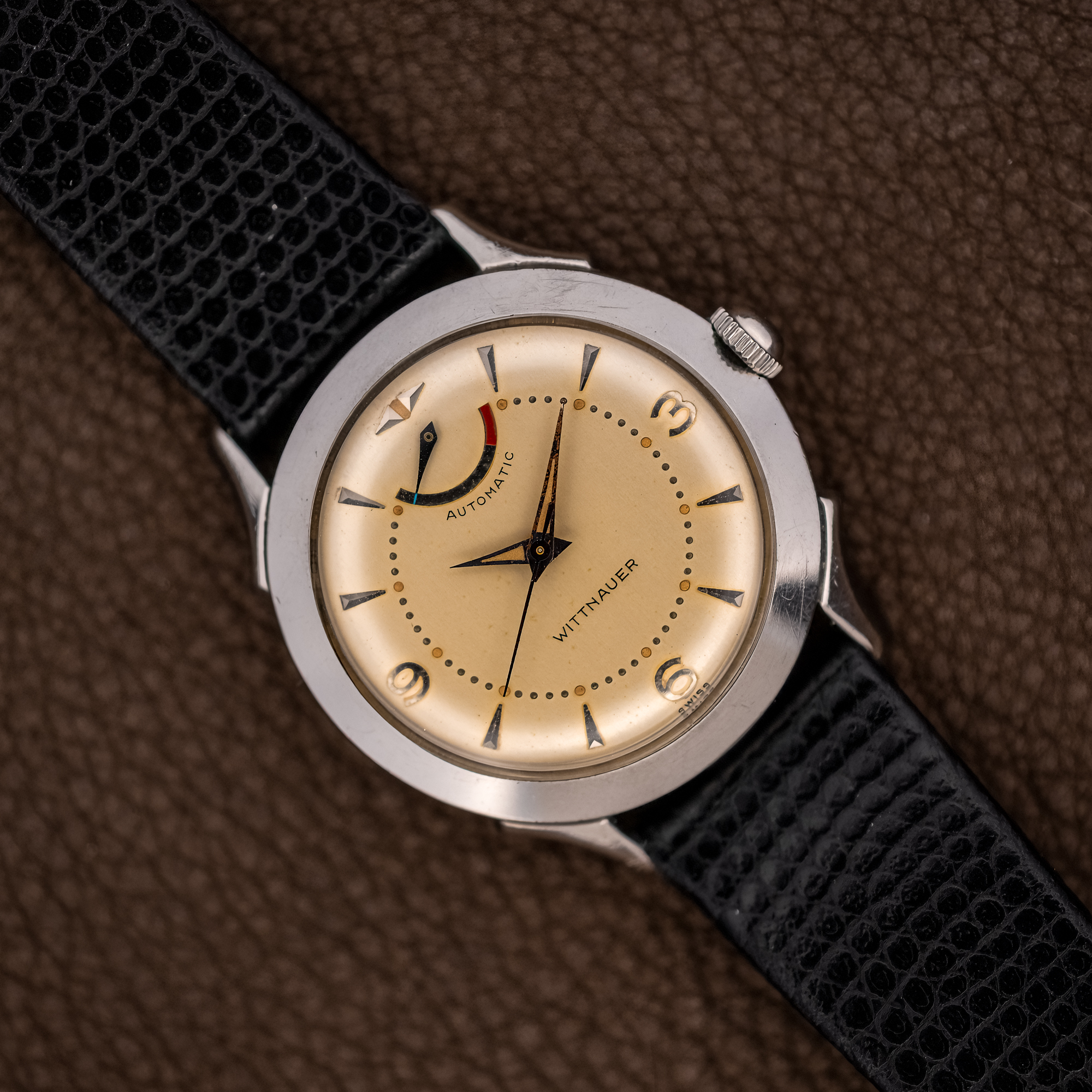 DSCF7769-Topaz-Sharpen-Strong-Denoise Wittnauer 2092 overhead view with cream dial, curved power reserve indicator and textured black strap