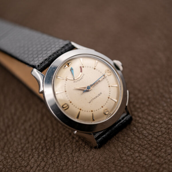 Wittnauer 2092 opposite angled view highlighting cream dial, applied numerals and polished case edges