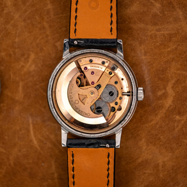Omega caliber 551 automatic movement in the open 167.070 case, serial 26300815 visible