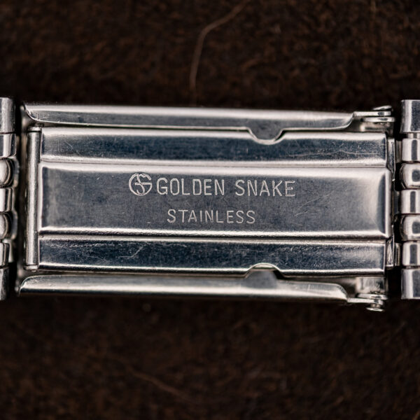 Inner plate of the bracelet's folding clasp on the 1961 Omega Seamaster, showing maker and Stainless stamps
