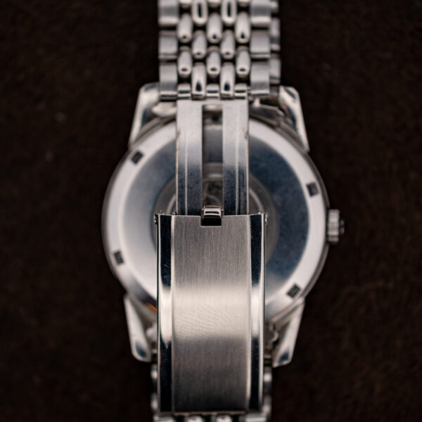Folding clasp of the Omega Seamaster bracelet partly opened, seen from the back of the watch
