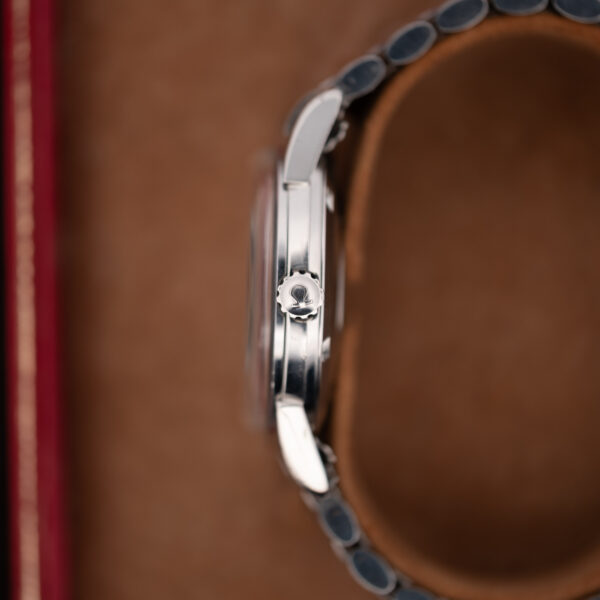 Crown-side profile of the steel Omega Seamaster 14761 with Omega-marked crown and domed crystal