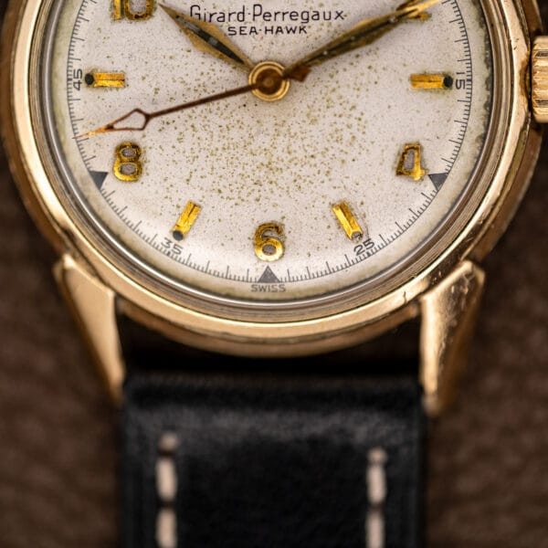 Girard Perregaux Sea Hawk B-1801 lower dial detail showing Swiss signature and open diamond seconds hand