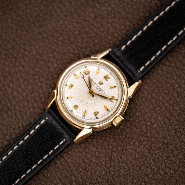 Girard Perregaux Sea Hawk B-1801 arranged diagonally with stitched black leather strap and applied hour markers