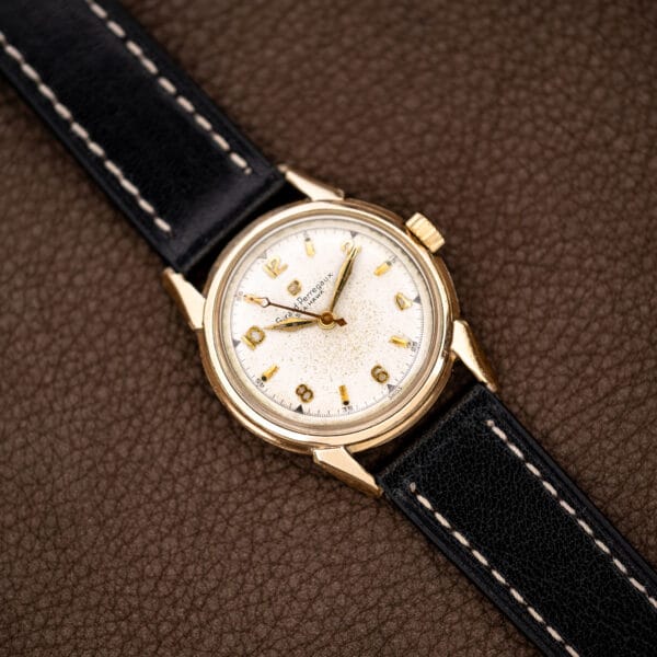 Girard Perregaux Sea Hawk B-1801 full view with alternating numerals, baton markers and stitched strap